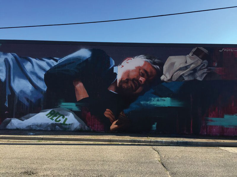 Brandon Downtown Mural – Resting Man – 704 Pacific Avenue, Brandon
