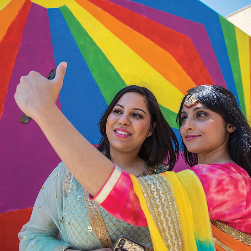 Selfie in front of a mural in Downtown Brandon, Manitoba