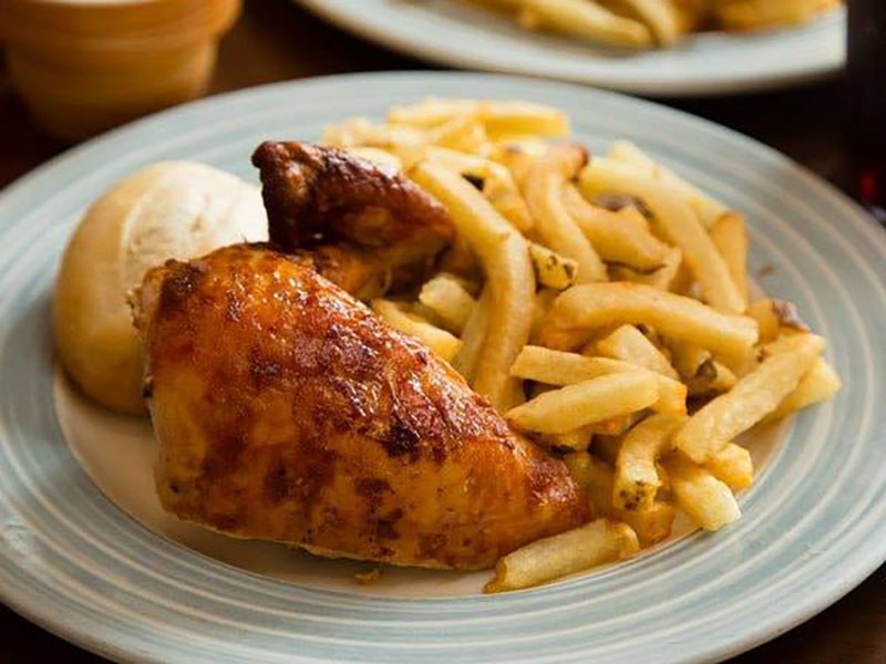 Chicken and fries from Swiss Chalet in Brandon, Manitoba