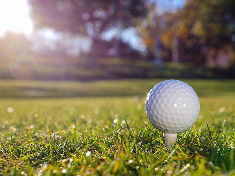 Golf ball on a tee