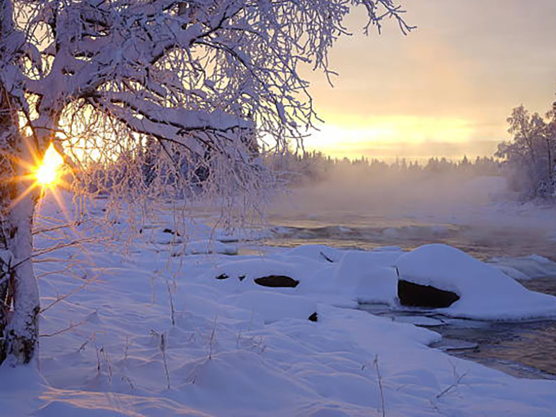 Sun just above the horizon in very cold weather